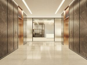 Clean commercial building lobby with polished stone floor